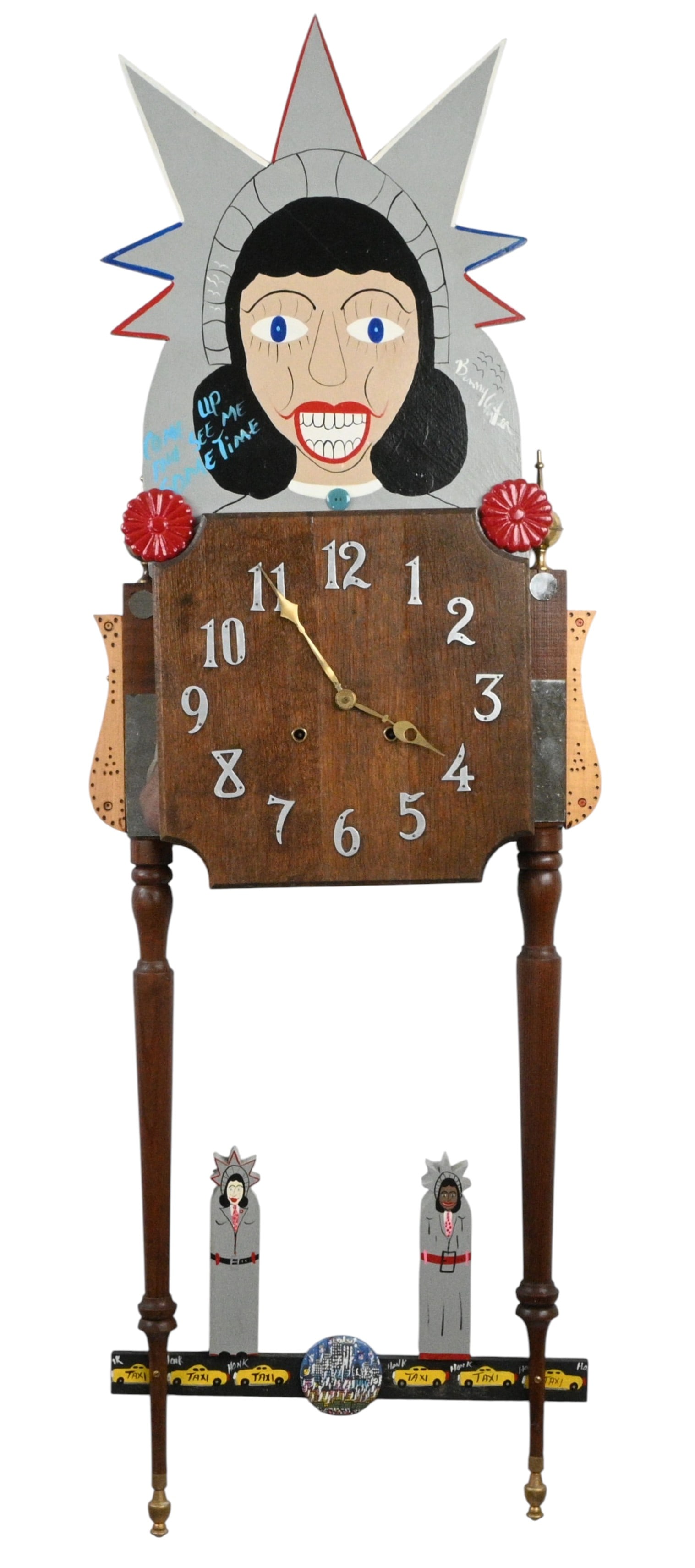 Benny Carter. Lady Liberty Clock: Benny Carter. (1943-2014) Lady Liberty Clock. Signed and Titled. Very well made, with good painting, decoration, and writing both on the front and the back. The clock has 2 brass finials; hand carved,