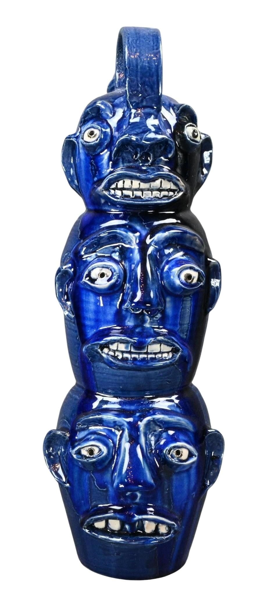 Randy Tobias. Three Stack Blue Face Jugs: Randy Tobias. Three Stack Blue Face Jugs. 2026. Signed. Mint condition. Size: 19.25" H. Provenance: Direct from Randy Tobias. Let's help support living artists. Est. $300 - $600. Ship: In-House
