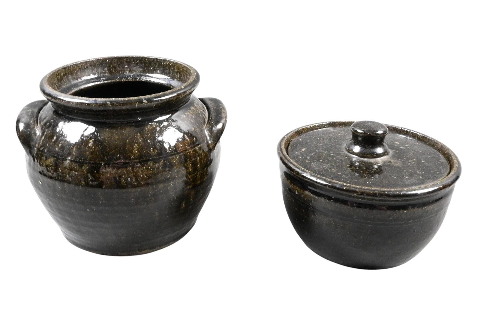 Lanier Meaders. Two Pots: Lanier Meaders. Two Pots. Signed. The pot without handles has a lid. The pot with handles does not have a lid. Mint condition. Size: Largest is 6.25" H. Provenance: Private Georgia Collection. Est.