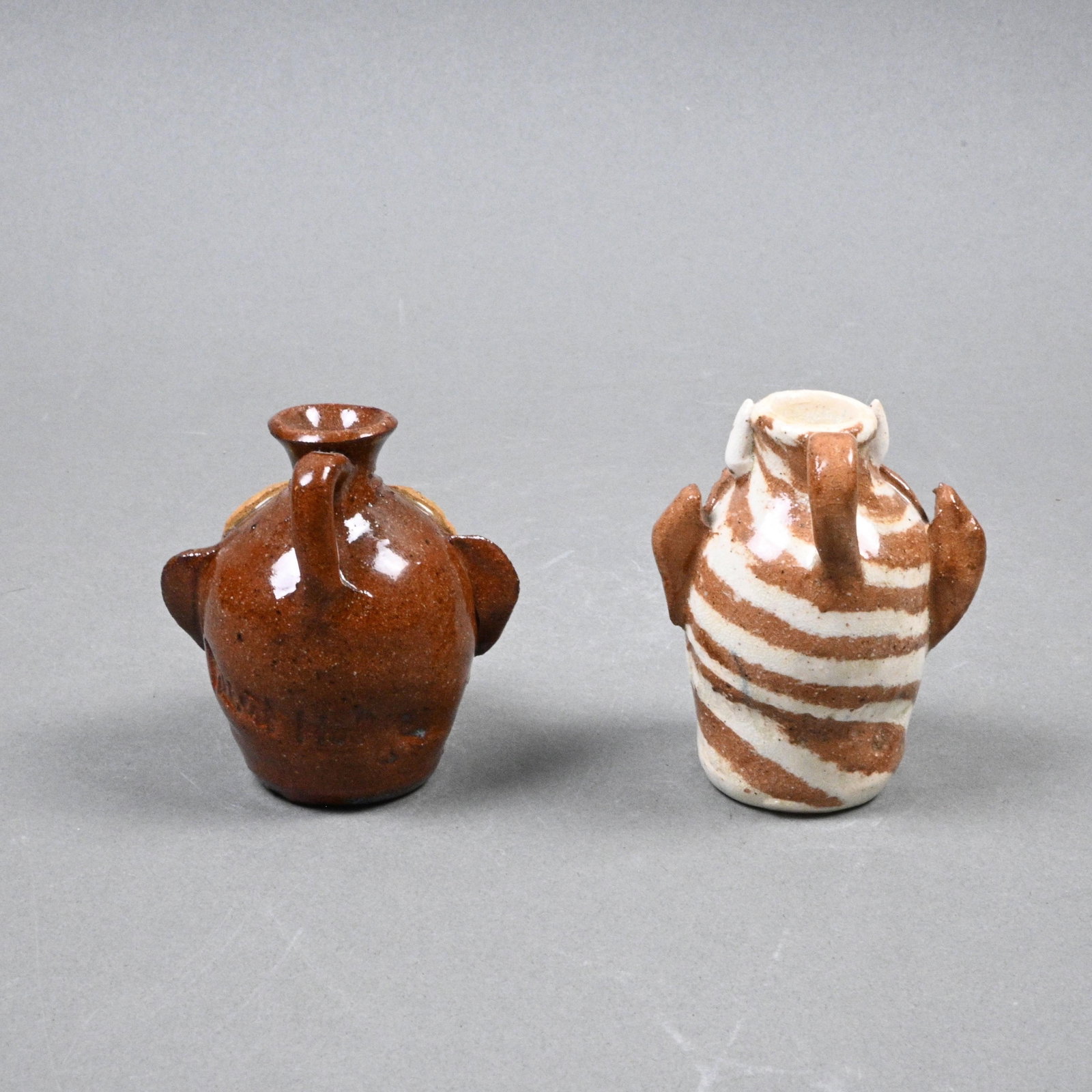 Albert Hodge. Two Mini Face Jugs - 4