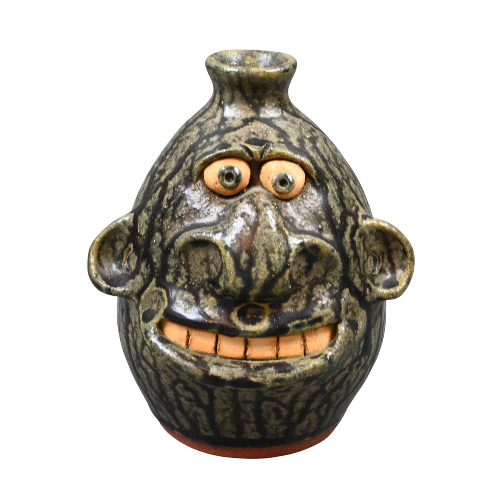 Brian Wilson. Face Jug: Brian Wilson. Face Jug. 1998. Signed. Mint condition. Size: 7" H. Provenance: Collection of Micki Beth Stiller. Montgomery, AL. Est. $100 - $200. Ship: In-House Shipping Available.