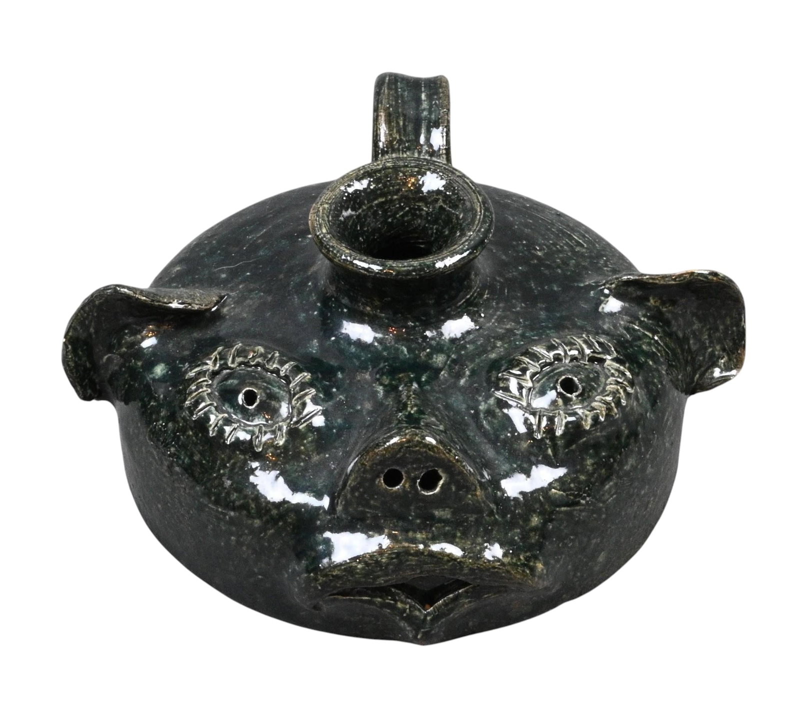 Stanley Ferguson. Squatty Face Jug: Stanley Ferguson. Squatty Face Jug. Signed. Labeled #20. Mint condition. Size: 3" H. Provenance: Collection of Micki Beth Stiller. Montgomery, AL. Est. $100 - $200. Ship: In-House Shipping Available.