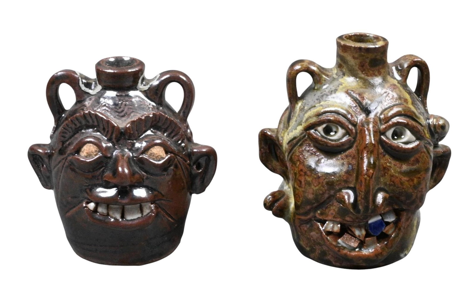Randy Myers. Two Mini Face Jugs: Randy Myers. 1998, 2007 Two Mini Face Jugs. Signed, Dated, and Titled. "For B.B. and Irene" and "Snake Bite Slim". Mint condition. Size: Largest is 3.5" H. Provenance: Collection of Micki Beth