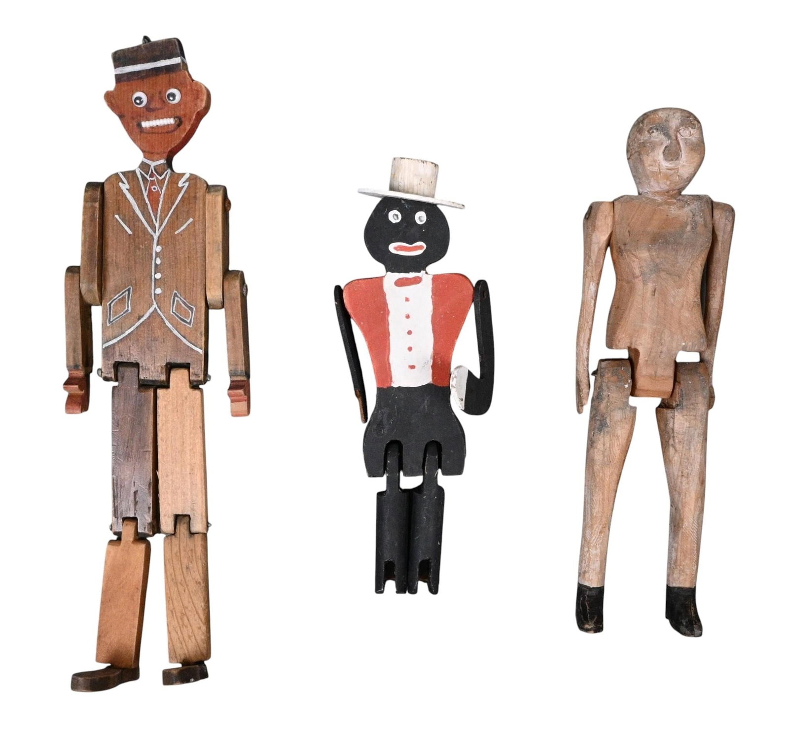 Hand Painted Articulated Folk Art Figures: Hand Painted Articulated Folk Art Figures. Hand carved and hand painted articulated wooden figures.. Black figure is missing a hand. Good overall condition. Size: Largest is 12.25" tall. Provenance: