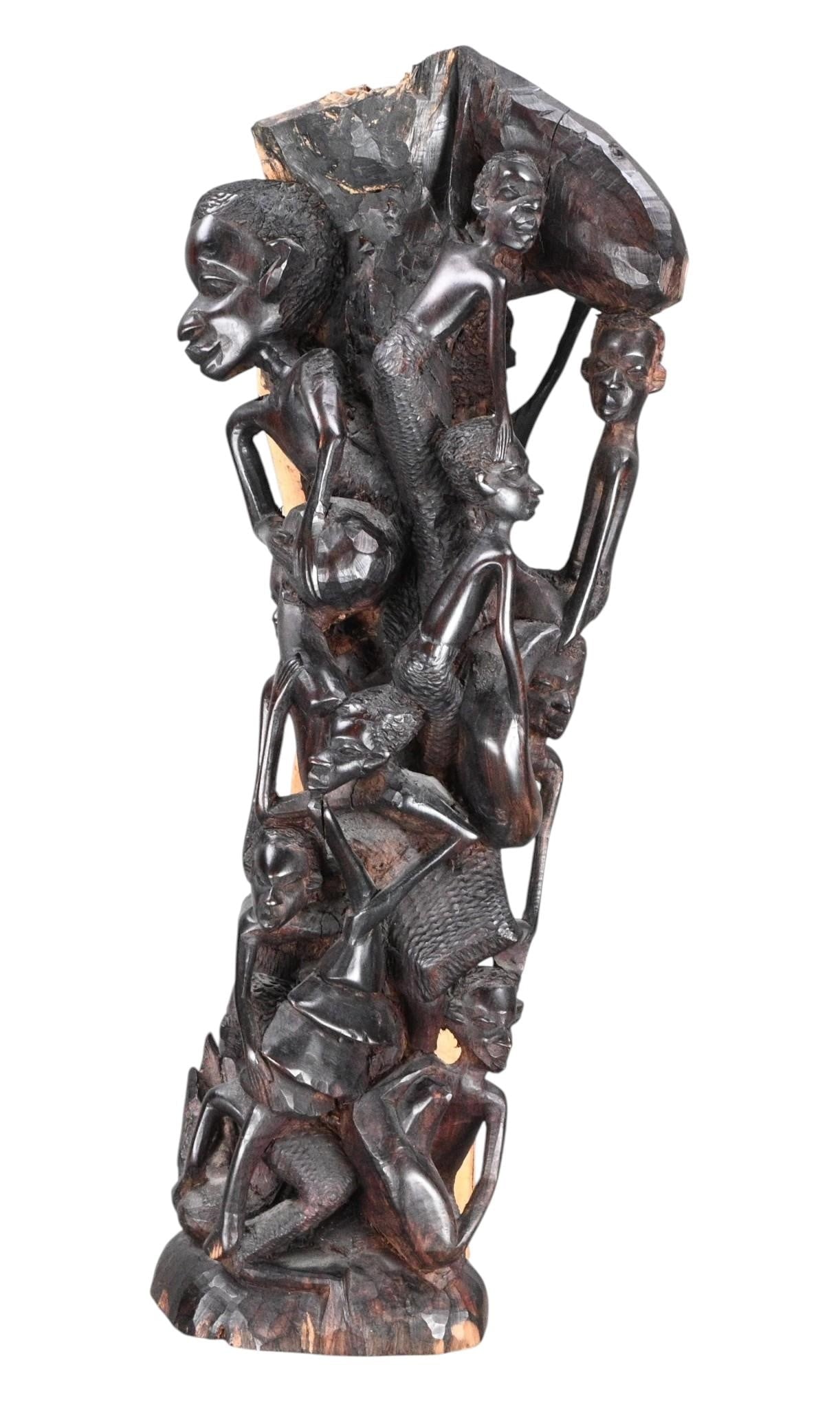 African Makonde Tree of Life Wood Carving: African Makonde Tree of Life Wood Carving. Not signed. African carved hardwood figural sculpture depicting intertwined human forms in a vertical openwork composition. Executed in the manner of Makonde