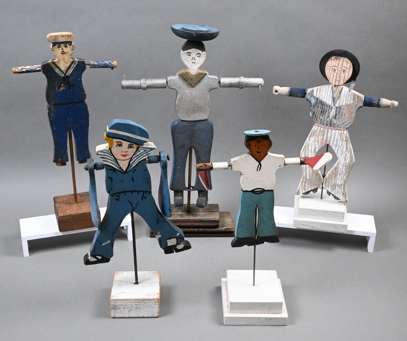 Five Figural Whirligigs: Five Figural Whirligigs. Mixed media. Paint on wood. Fair condition. Missing parts and missing paint. Size: Tallest is 18". Provenance: Private Alabama Collection. Est. $100 - $300. Ship: In-House