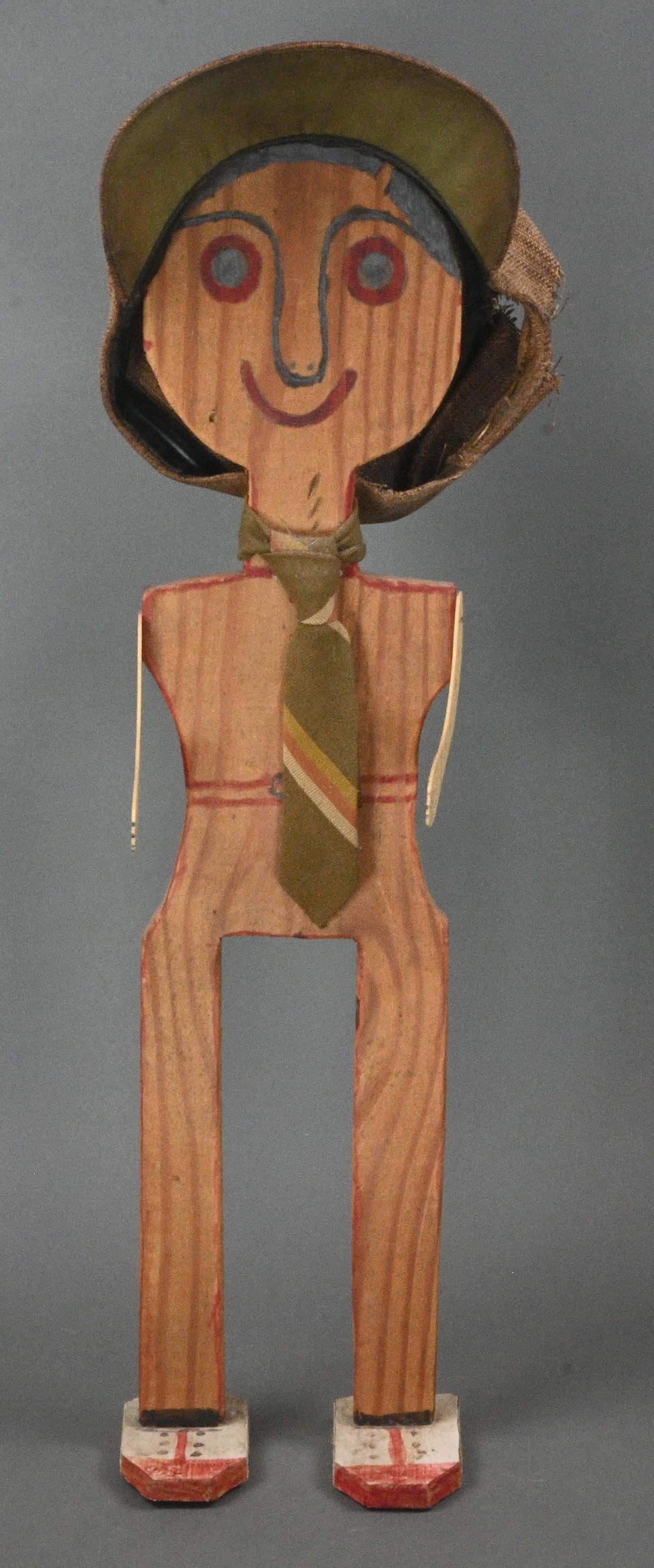 Buzz Busby. Man with Articulated Arms and Wearing a Hat: Buzz Busby. Man with Articulated Arms and Wearing a Hat. Not Signed. Marker and ink on wood. Good condition. Hat is worn, but it is intended to be. Size: 23.5" H x 6" W x 5" D. Provenance: Collection
