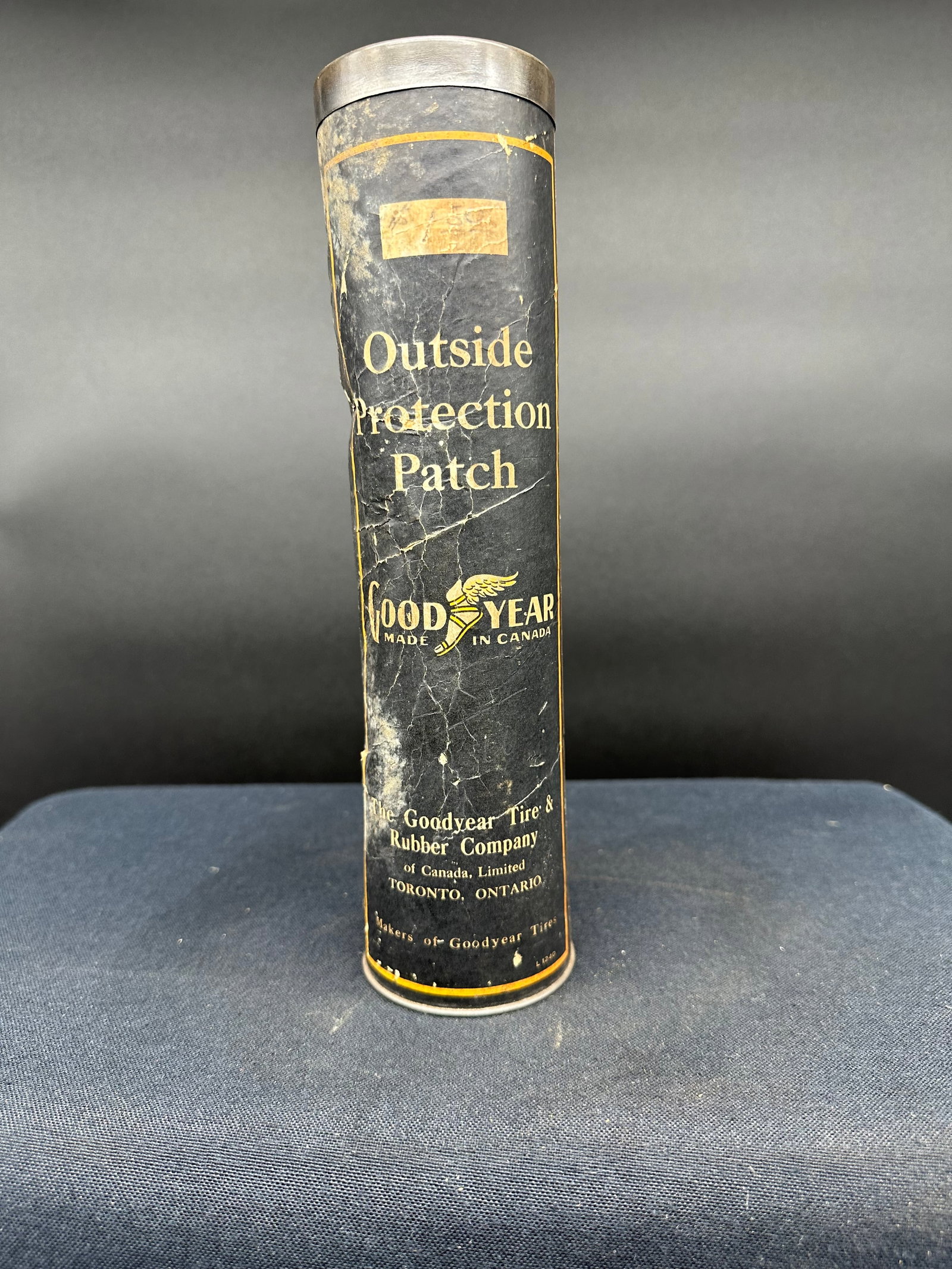 GOODYEAR OUTSIDE PROTECTION TUBE PATCH KIT: Has wear, still contains the original contents