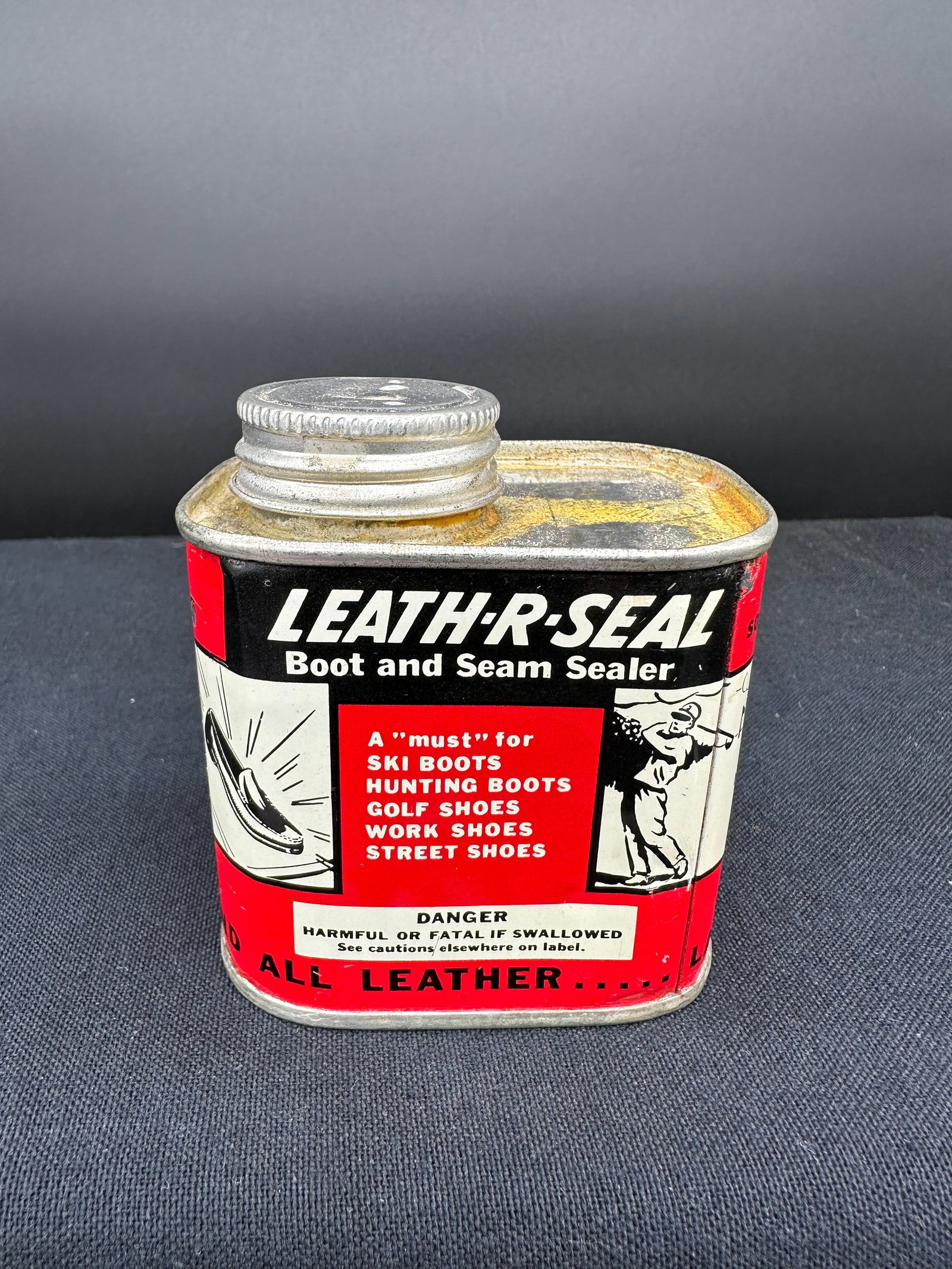 GRAPHIC LEATH-R-SEAL BOOT AND SEAM SEALER METAL CAN: Nice graphics, full.