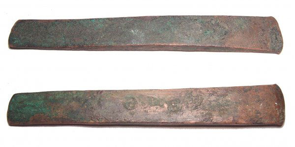 Egypt, Pre-Dynastic Period, c.3100 - 3000 BC. A ni: Egypt, Pre-Dynastic Period, c.3100 - 3000 BC. A nice copper adze blade with sharpened end and nice red. Brown and green patination. L: 8". See Petrie, Tools and Weapons, pl. XVI, nos. 64. Ex Leighton