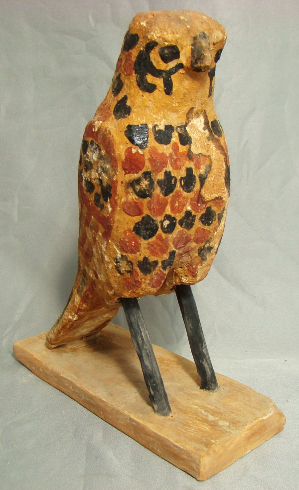 Egypt, Late Period, a colorful wood bird as HORUS: Egypt, Late Period, 20th-30th Dynasties, 715-332BC., a nicely crafted wood bird as "Horus". Nicely painted with speckled wing design in shades of black and pale red. Choice. Stand is new. H: 6". Choic