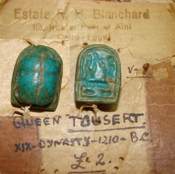 Egypt, XIX Dynasty, scarab of "Queen Tousert": Egypt, XIX Dynasty, c. 1210BC. A nice blue / green faience scarab of "Queen Tousert" with nice cartouche. Affixed to antique card that reads, " Estate R.H. Blanchard, Cairo, Egypt and hand written by
