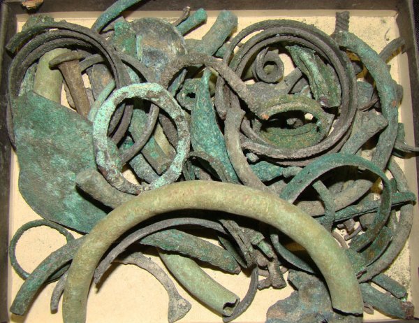 A large mixed lot of small ancient bronzes: A large mixed lot of small ancient bronzes, all from the Leighton Wilkie collection. The lot consisting of fragments of bracelets, broaches, fibulae, rings and other odd and ends from Egypt and the Ne