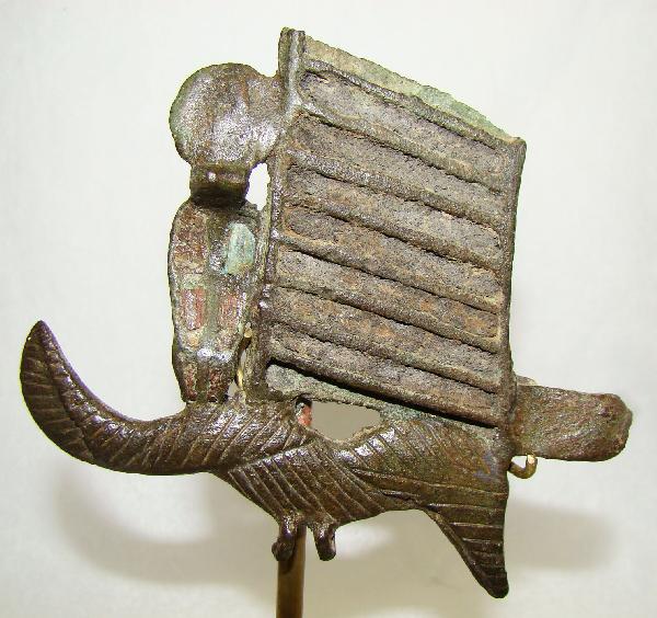 Egypt, an attractive bronze "Atef" crown: Egypt, Late Period, 20th-30th Dynasties, 715-332BC, the left section of an attractive bronze "Atef" crown with highly detailed ram's horn, ostrich feather and inlaid cobra head wearing solar disc. Upp