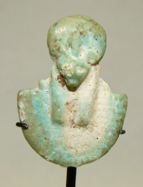 Egypt, Ptolemaic Period, 300 BC. Aegis with Sekhmet: Egypt, Ptolemaic Period, 300 BC. Aegis with Sekhmet, Blue-glazed faience amulet. Superb detail. Size is .75" x .5". Custom stand. Old San Francisco collection.