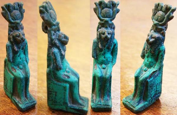 Egypt, Saite Period, lion headed goddess SEKHMET: Egypt, Saite Period, c. 8th Century B.C. to 4th Century B.C., a wonderful blue-green glazed faience amulet of the lion headed goddess Sekhmet. She is elegantly enthroned with her arms at her sides. Sh