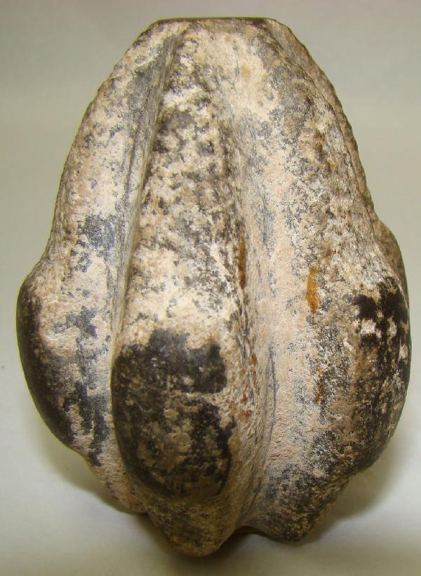 Persia, rare stone mace, carved in "grenade" style: Persia, Luristan, c. 1200BC., a rare stone mace. Carved in "grenade" style from a pale grey stone and perhaps the ancient model for today's modern version. H: 3". Joel L. Malter Collection, ROA 1648. 