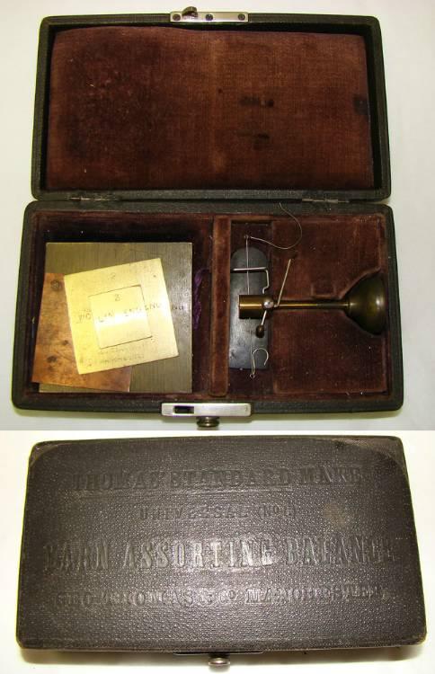 England, c. 1875, Yarn scale. Geo. Thomas & Co.: England, c. 1875, Yarn scale. Thomas' Standard Make Universal no. 4. Yarn Assorting Balance. Geo. Thomas & Co. Manchester. In original box with embossed lid. One hinge is broken, otherwise scale is in