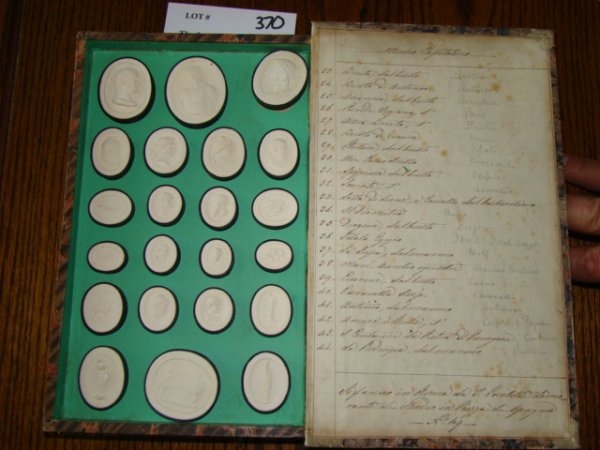 Museo Capitolino. Paoletti Impronte. Hard cover bo: Museo Capitolino. Paoletti Impronte. Hard cover box meant to look like a book, ½ leather with marbled boards. Gilded lettering on spine. Inside is a set of 22 plaster impressions of some of the fines