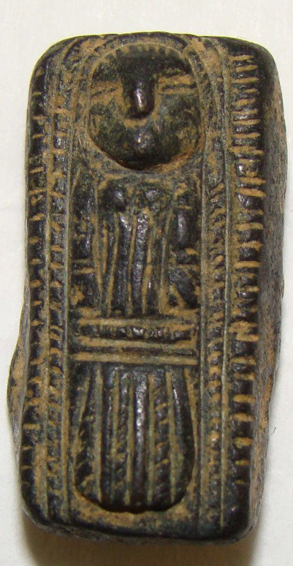 Syria / Egypt, weight with highly detailed reclining: Syria / Egypt, 1321-1295BC, a fabulous small rectangular shaped bronze weight with highly detailed reclining man. Weight is 31.53 grams. His hand's are at his sides; entire top of piece with attractiv