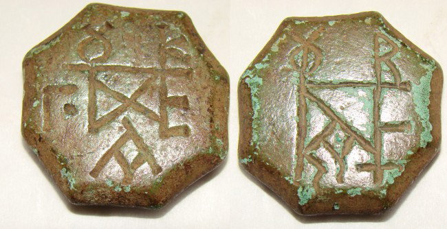 Byzantine, a medium size bronze octagonal weight: Byzantine, 800-1000AD., a medium size bronze octagonal weight, 26.5 grams and measuring 1", with exceptionally incised symbols on the obverse and reverse to include alphabetic and numerical symbols. Q