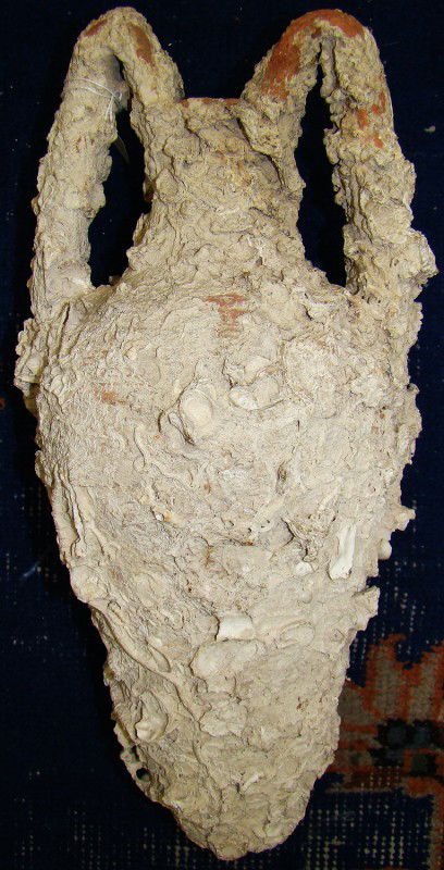 Greco-Roman, nice orange slip wine amphora: Greco-Roman, c. 3rd-1st Century B.C., a smaller pale orange slip wine amphora, the body tapering to a pointed foot, the short and narrow cylindrical neck with twin vertical handles that elevate slight