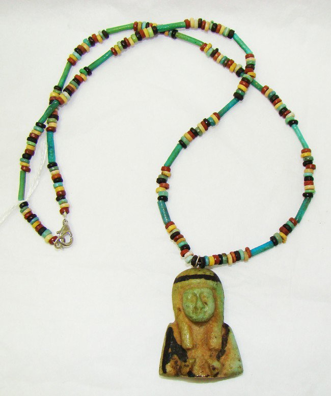 Egypt, Late Period, mummy bead necklace & pendant: Egypt, Late Period, 20th-30th Dynasties, 715-332BC., an attractive and wearable single strand necklace consisting of small and tubular multi-colored faience "mummy beads". The pendant is the upper tor