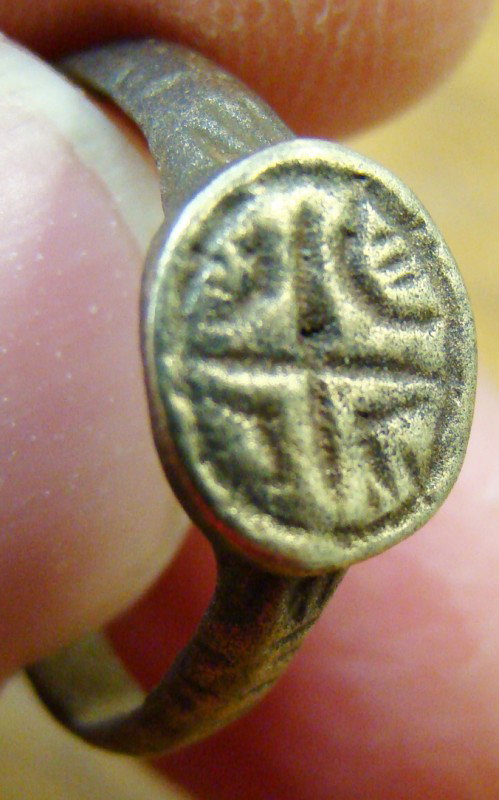 Byzantine, Christian bronze ring with "cross" : Byzantine, c. 400-600AD., an early Christian bronze ring with "cross" motif on top. Weight is 3.04 grams. Ring size is 6.5. Nice!
