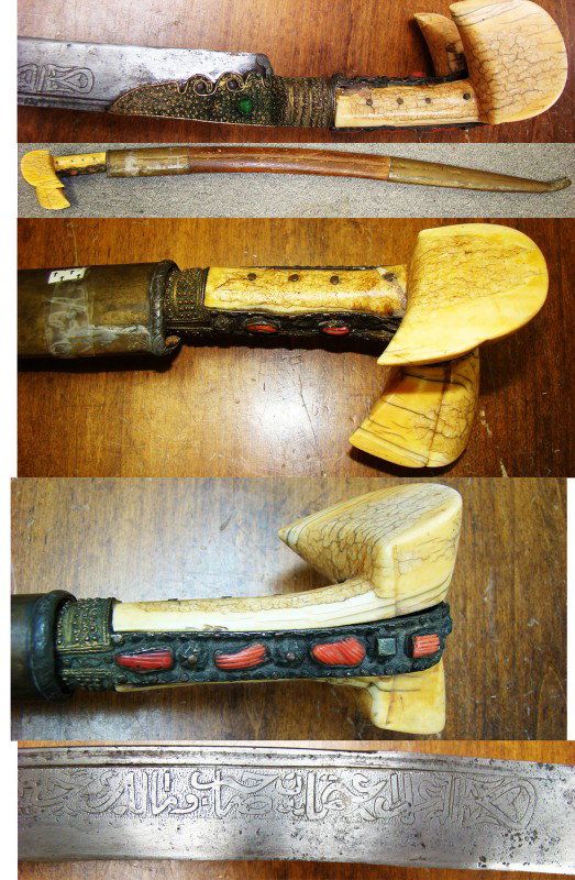 Caucasia, a pristine "Yataghan" or sword: Caucasia, Hegira date on one side of blade reads 1281, a "Yataghan" or sword. Ornate sword has large ivory grip (probably mastodon) that flares into a double eared pommel. Hilt with orange coral and d