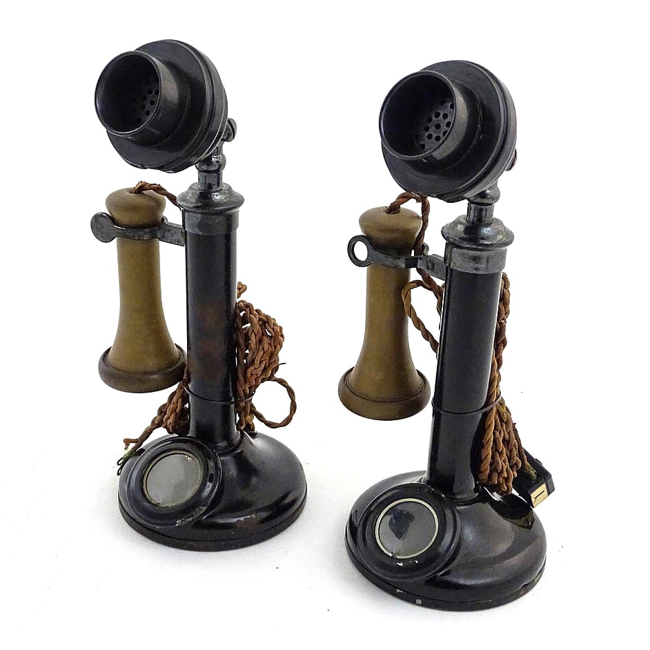 PAIR OF CAST IRON STEEL AND BAKELITE CANDLESTICK TELEPHONES (1 of 3)