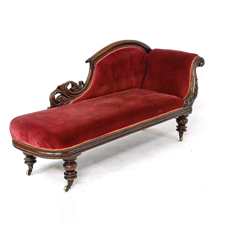 VICTORIAN MAHOGANY CHAISE LOUNGE WITH FLORAL CARVINGS: Dimensions: 81 in. (205.7 cm) long × 24 in. (61 cm) wide × 36 in. (91.4 cm) high.