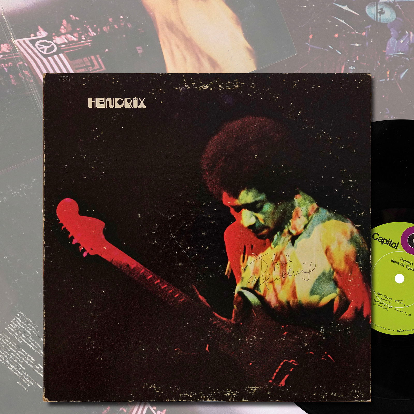 JIMI HENDRIX SIGNED LP "BAND OF GYPSYS": 12 1/4 x 12 1/4 in This is a Jimi Hendrix-signed LP cover of Band of Gypsys, featuring a flowing inscription "To Mimi" followed by Hendrix's full autograph in pen, situated prominently on the lower ri