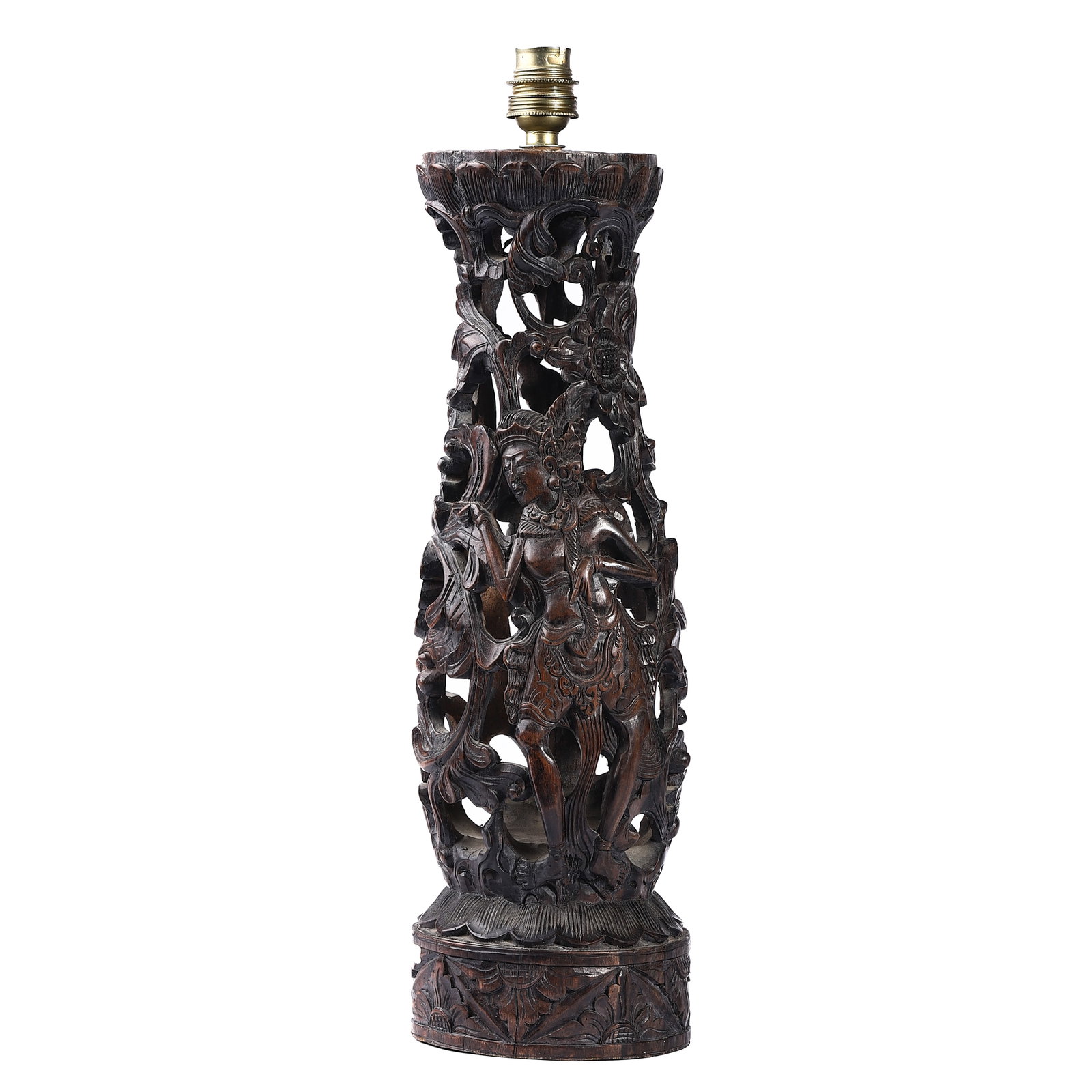 A CARVED WOOD FIGURAL TABLE LAMP: Dimensions Height: 16 3/4 in (42.5 cm) Description Finely carved from hardwood, the openwork body depicts a richly adorned celestial maiden standing amidst scrolling foliage and blossoming flowers. Th