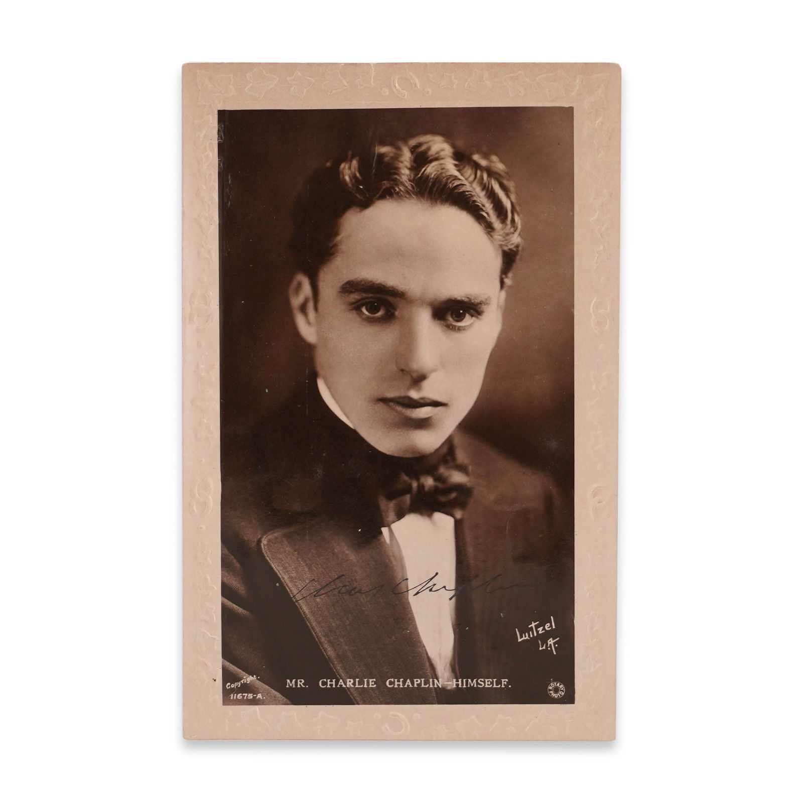 CHARLIE CHAPLIN SIGNED REAL PHOTO POSTCARD, EARLY 20TH CENTURY (1 of 2)
