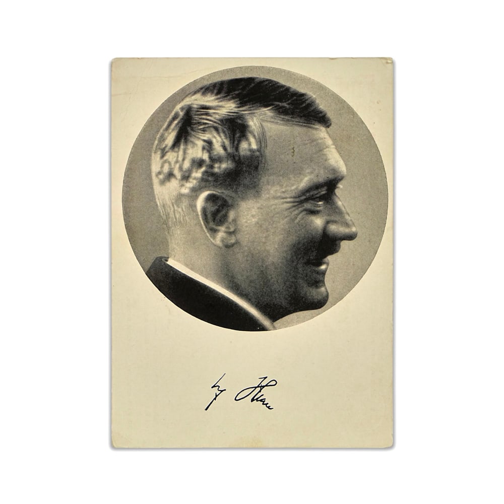 ADOLF HITLER SIGNED POSTCARD: 5 3/4 x 4 1/8 in (14.6 x 10.6 cm) This signed postcard presents a concise yet historically charged artifact from the twentieth century. As a period postcard bearing Adolf Hitler's signature, the piece