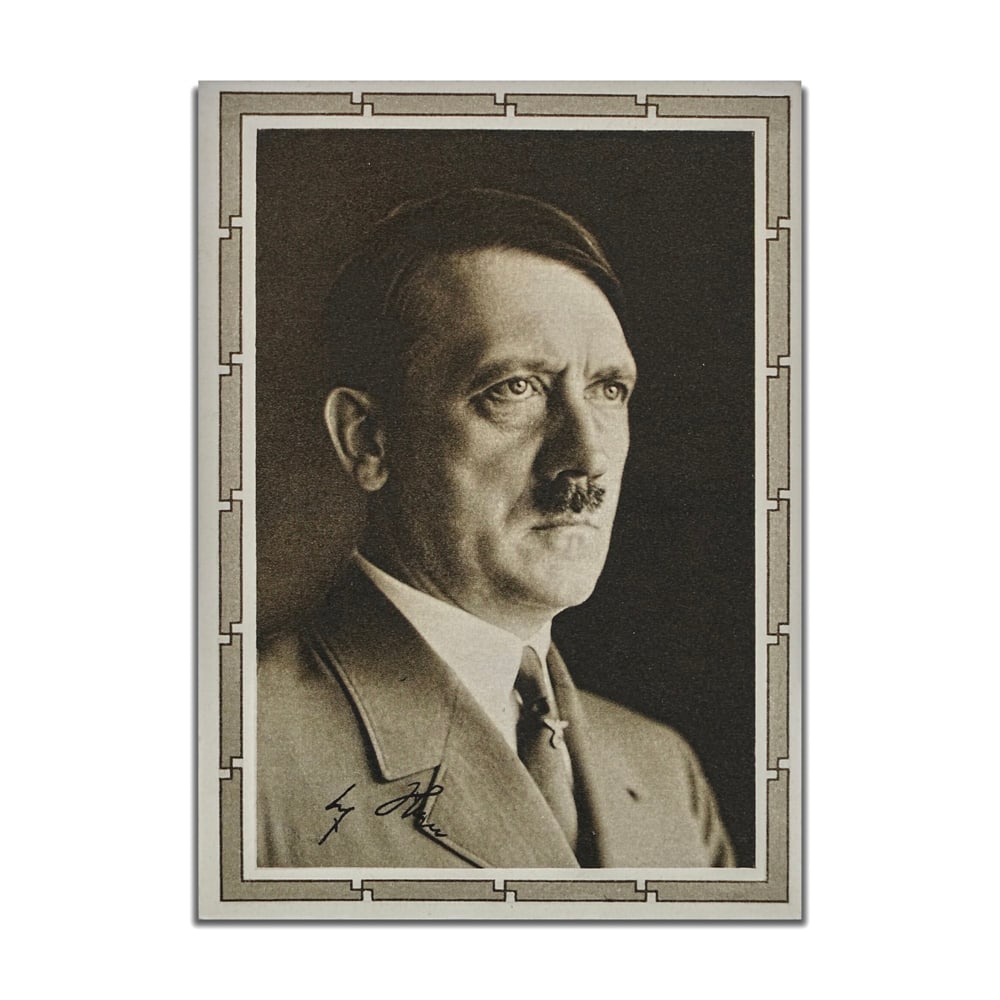 ADOLF HITLER SIGNED POSTCARD: 5 7/8 x 4 1/8 in (14.8 x 10.6 cm) This signed postcard represents a compact yet information-dense artifact drawn from the visual and postal culture of its period. The recto presents a formal portrait 