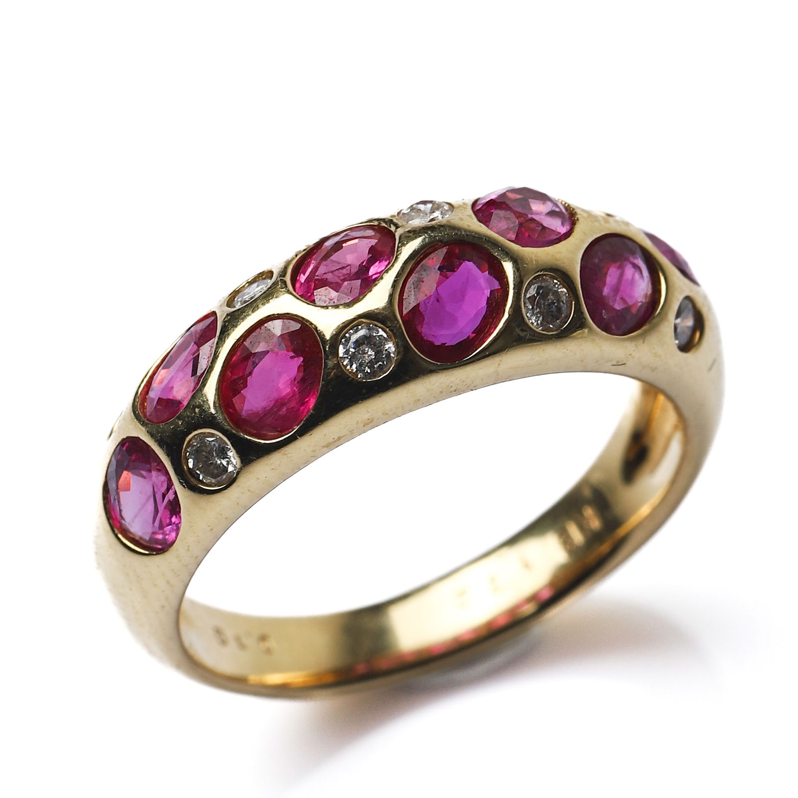 18K GOLD BURMESE RUBY AND DIAMOND RING: Dimensions Inner diameter: 21/32 in (16.7 mm); Weight: 5.3 g Description This refined ring is crafted in 18k yellow gold and set with a series of vivid Burmese rubies with a total weight of approximat