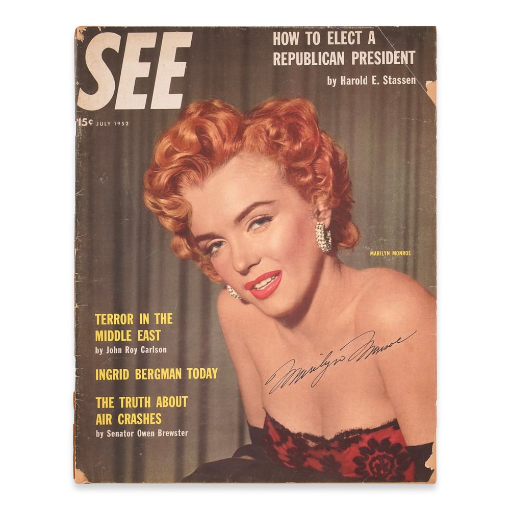 MARILYN MONROE SIGNED SEE MAGAZINE: 13 x 10 1/4 in (33 x 26 cm) Provenance and Authentication: This collectible has undergone a rigorous forensic evaluation. The signatures were carefully analyzed across multiple criteria, including ink