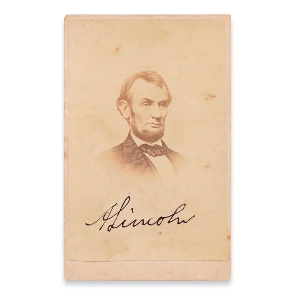 ABRAHAM LINCOLN SIGNED CDV PHOTOGRAPH: 3 7/8 x 2 1/2 in (10 x 6.2 cm) Provenance and Authentication: This collectible has undergone a rigorous forensic evaluation. The signatures were carefully analyzed across multiple criteria, including