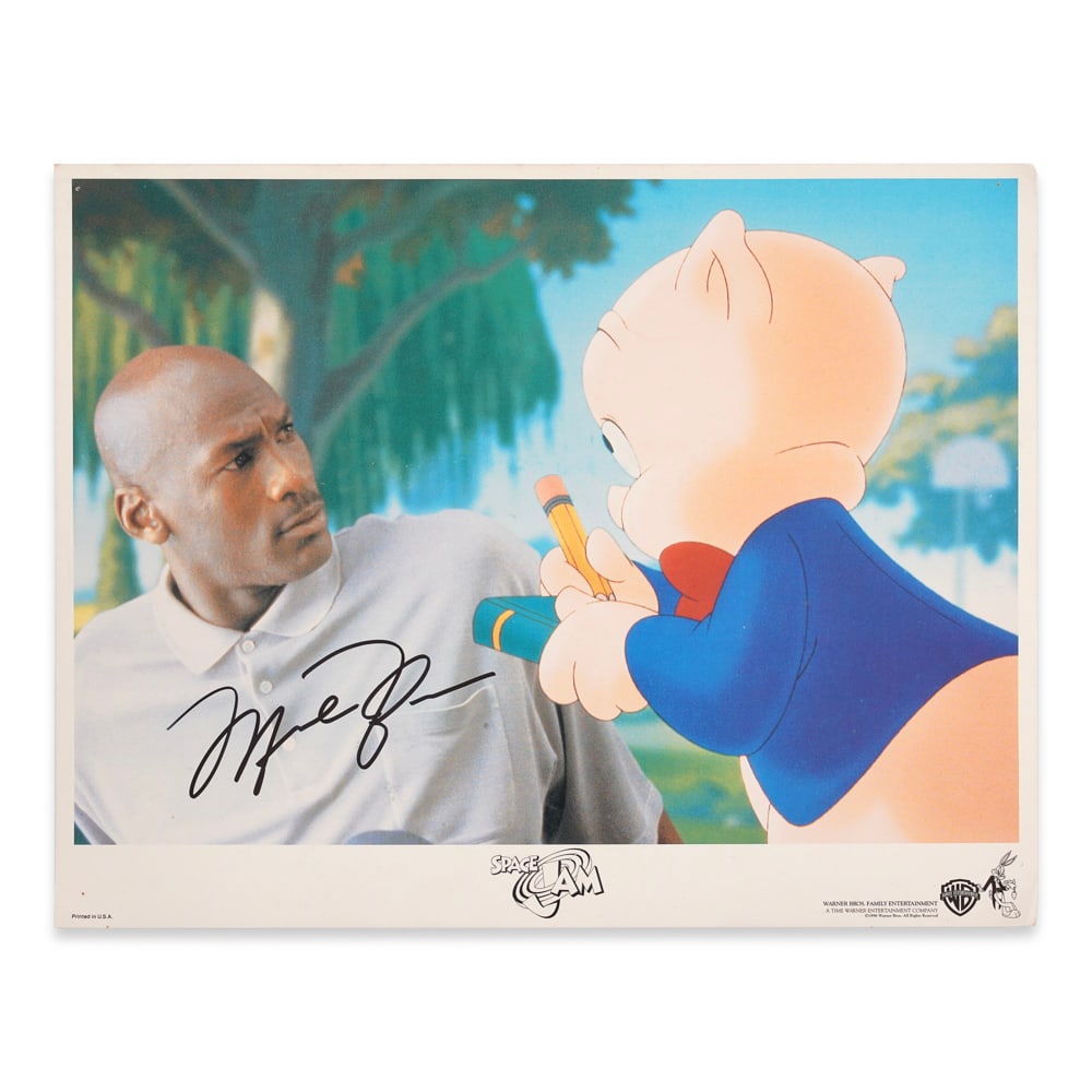 MICHAEL JORDAN SIGNED SPACE JAM MOVIE STILL (TAIWAN EDITION): 14 x 11 in (35.5 x 28 cm) This signed Space Jam movie still captures one of the most iconic crossovers between sports and popular culture in modern history. Michael Jordan stands as a defining