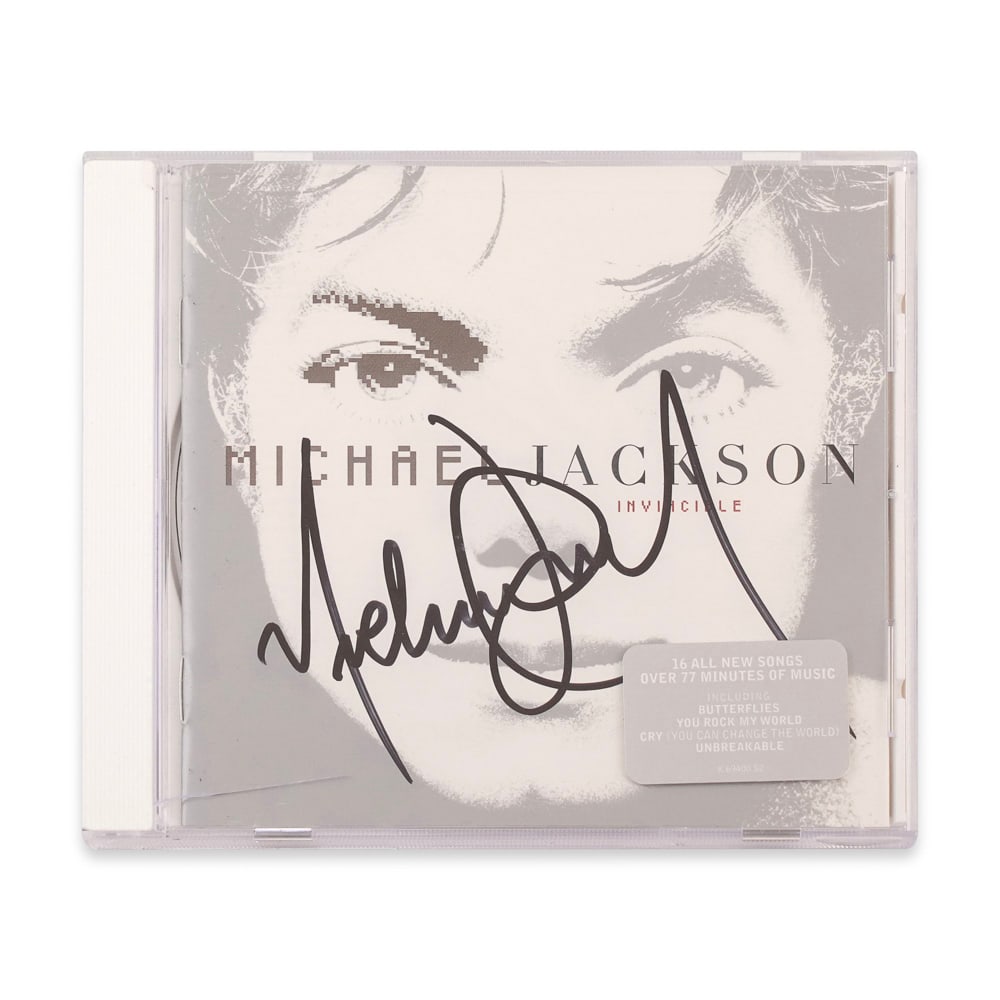 MICHAEL JACKSON SIGNED INVINCIBLE CD: 5 1/2 x 4 7/8 in (14 x 12.5 cm) Provenance and Authentication: This collectible has undergone a rigorous forensic evaluation. The signatures were carefully analyzed across multiple criteria,