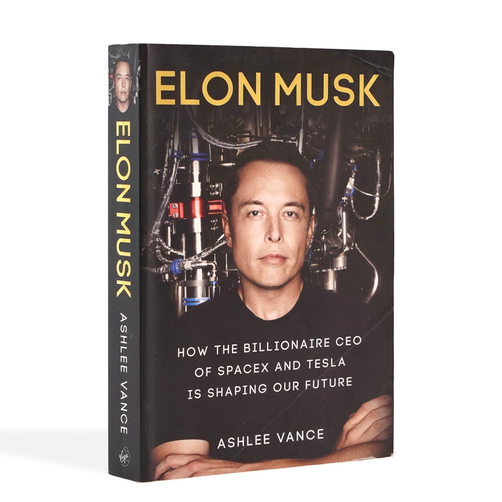 ELON MUSK SIGNED BOOK - ELON MUSK: HOW THE BILLIONAIRE CEO OF SPACEX AND TESLA IS SHAPING OUR FUTURE: 9 1/8 x 6 in (23.3 x 15.2 cm) This signed copy of Elon Musk: How the Billionaire CEO of SpaceX and Tesla Is Shaping Our Future represents a compelling convergence of modern technological history, cont