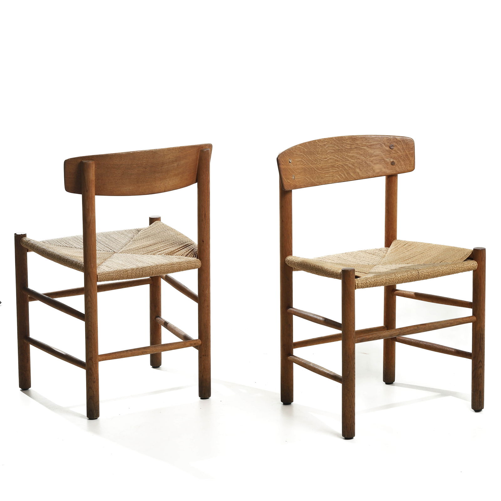 A PAIR OF RUSTIC OAK AND RUSH-SEAT CHAIRS, MID-20TH CENTURY (1 of 5)