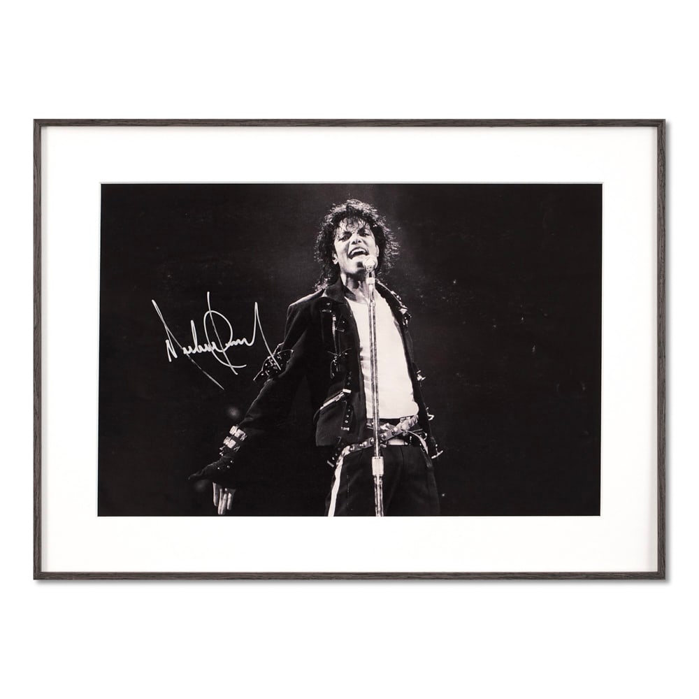 MICHAEL JACKSON SIGNED POSTER: Image Dimensions: 17 3/4 x 11 3/4 in (45 x 29.7 cm) Framed Dimensions: 22 x 16 1/8 in (56 x 41 cm) Provenance and Authentication: This collectible has undergone a rigorous forensic evaluation. The sig