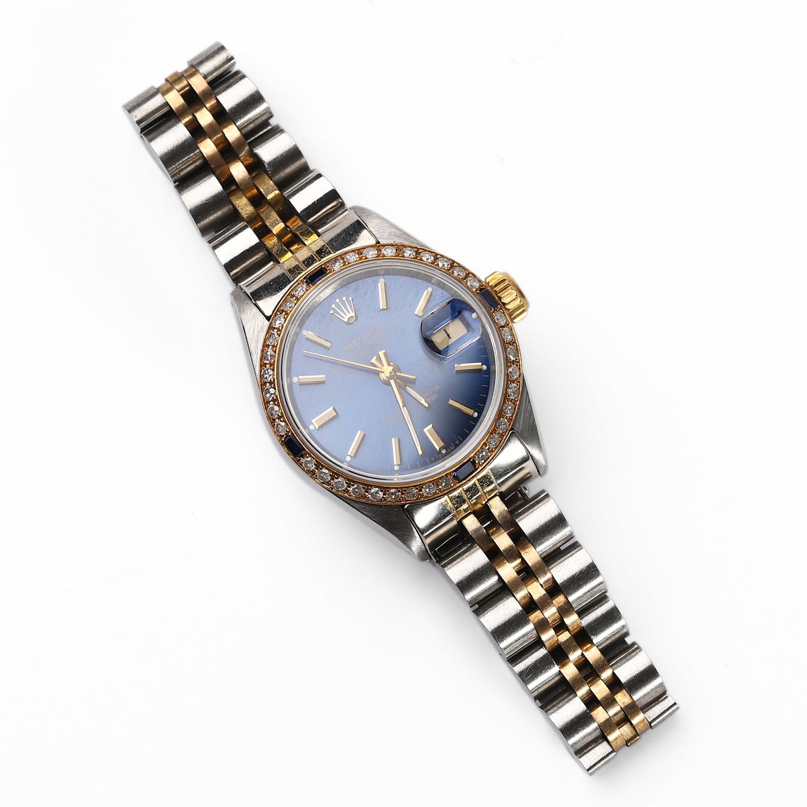 ROLEX OYSTER PERPETUAL DATEJUST STAINLESS STEEL AND GOLD WRISTWATCH WITH DIAMOND BEZEL: Dimensions: Dial diameter approx. 1 1/16 in. (27.5 mm)A Rolex Oyster Perpetual Datejust wristwatch featuring a vibrant sunray blue dial with applied gold baton hour markers, sweep center seconds, and