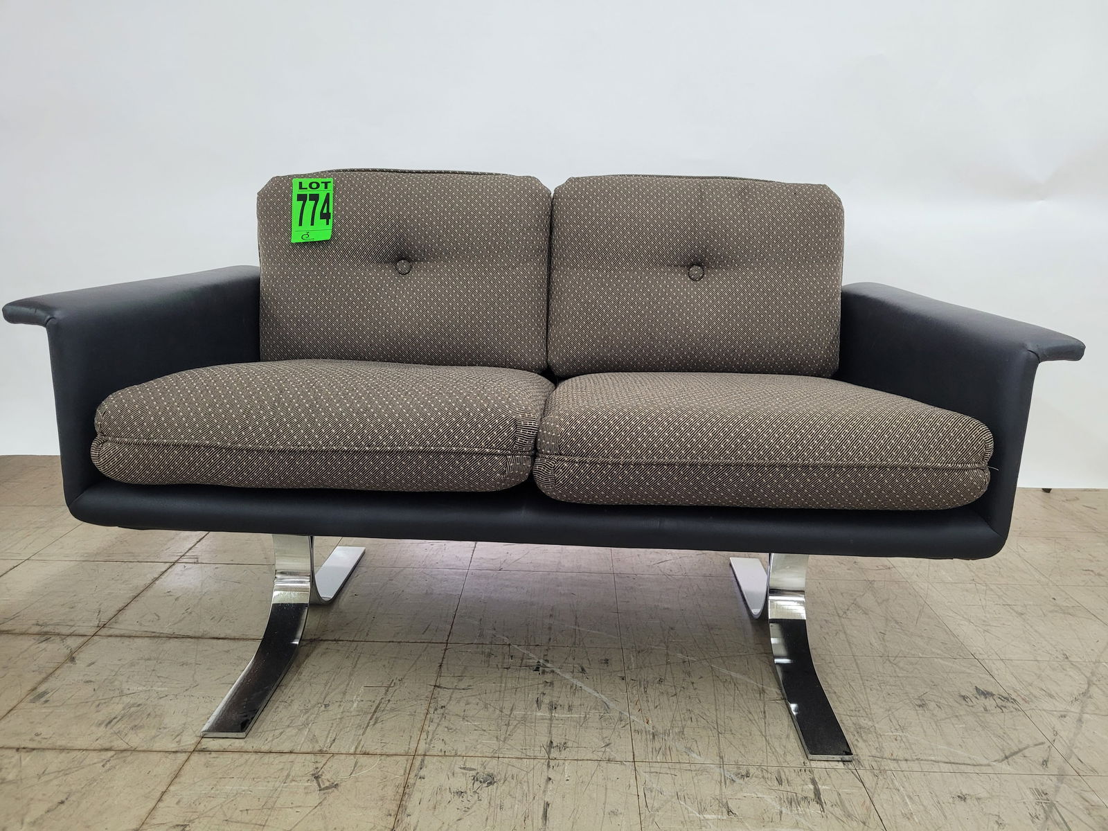 Two seat sofa with chrome base: Two seat sofa with chrome base