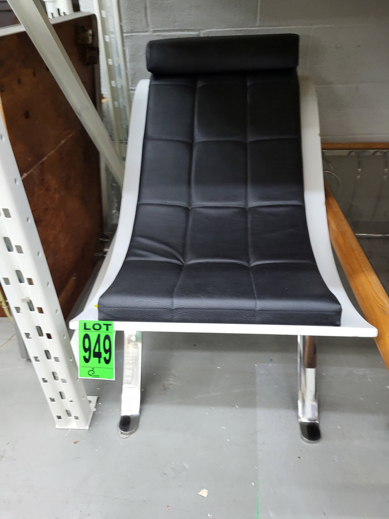 Curved Chrome and Leather Lounge Chair: Curved Chrome and Leather Lounge Chair