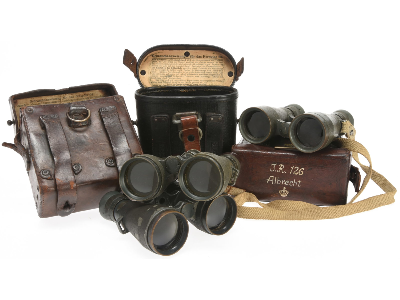 Imperial German Fernglas 08 Binoculars Lot: Three Sets: Imperial German Fernglas 08 Binoculars Lot: Three Sets Three sets of Fernglas 08 binoculars, includes one in an oval profileblack leather belt case with metal top lid, complete with instructions on th
