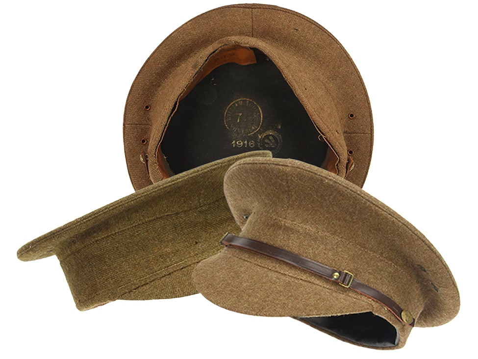 British WWI Pattern 1905 Service Dress Cap: Lot of Three: British WWI Pattern 1905 Service Dress Cap: Lot of three examples. First is in verynice overall condition has East Lancashire Regiment side buttons, a nice brown leather chinstrap, and an issue stamp 