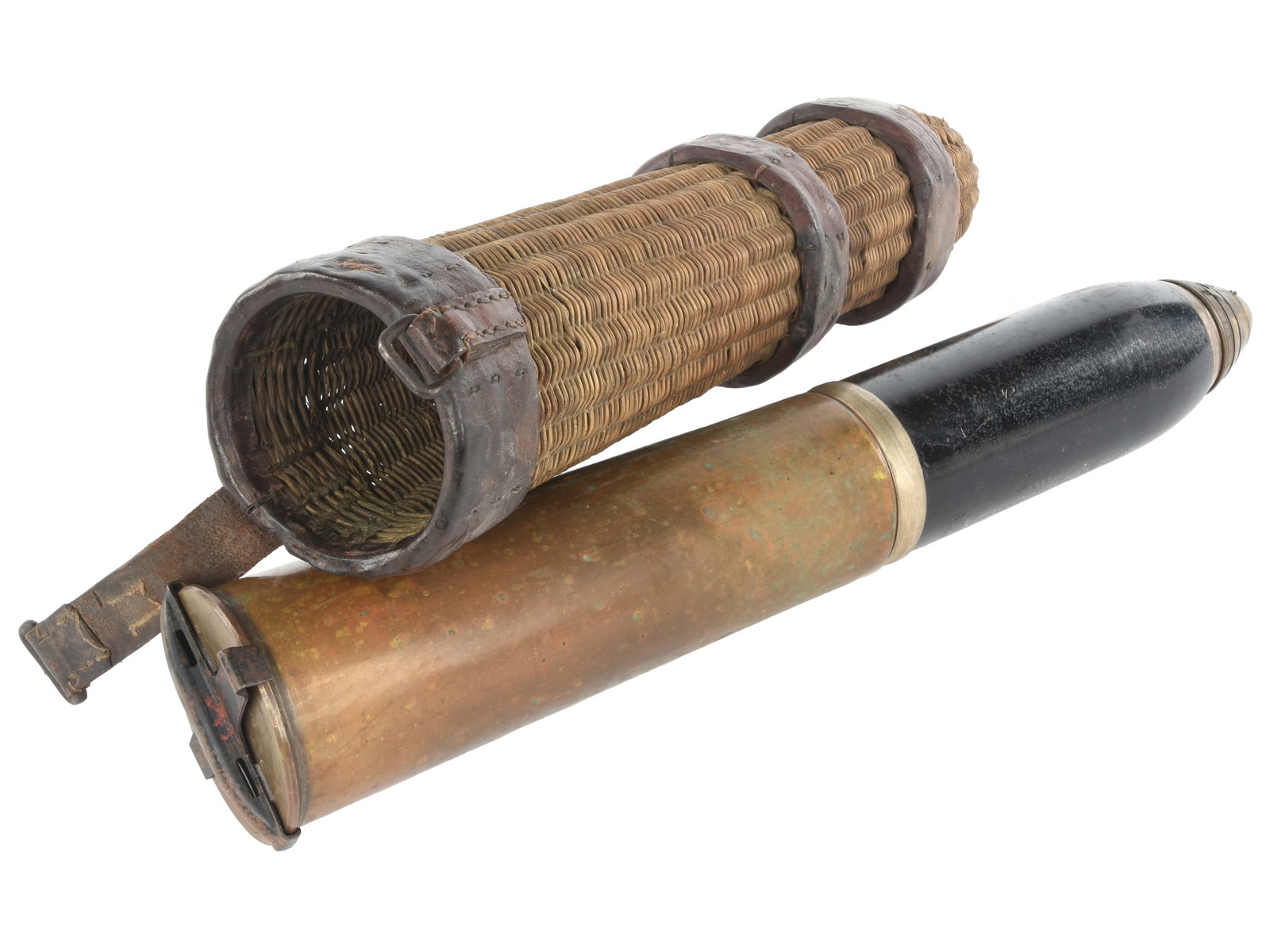 British WWI 18-Pounder Artillery Shell (inert) with Wicker Carrier: British WWI 18-Pounder Artillery Shell (inert) with Wicker Carrier 23-1/2" tall wood and leather reinforced wicker carrier for 18 pounder ammunition, contains an inert 18 pounder artillery shell (iner